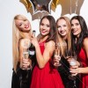 graphicstock-four-cheerful-young-women-having-party-and-drinking-champagne-over-white-background_SOZ2yVw2g_SB_PM